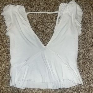 White flounce top